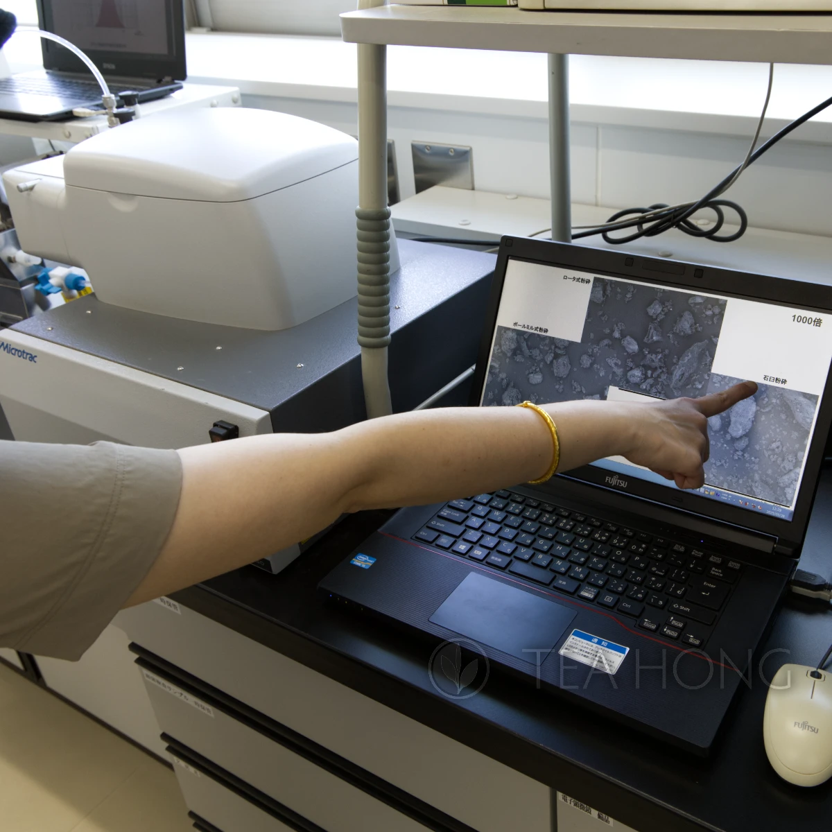 Particle size distribution monitoring set up in an office overlooking at the tea fields in Uji