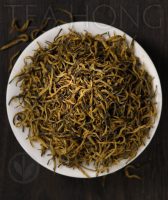 a black tea almost entirely made up of small golden orange colour pekoe