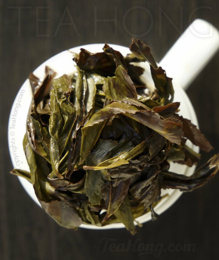 Infused leaves of Cassia Extraordinaire Wuyi Oolong