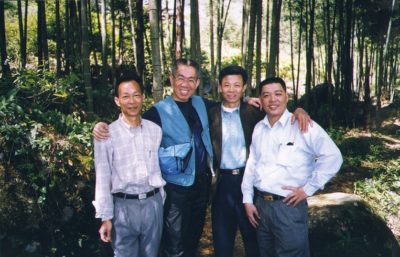 Leo with tea farmers in China