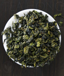 The rolled leaves of the green oolong Tieguanyin Traditional