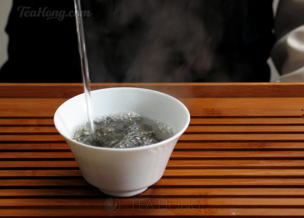 water being filled into the tea infusion vessel