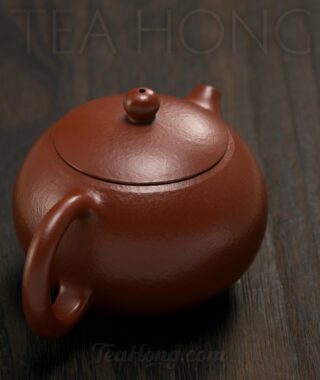 Fan Xi Ming: Xishi Yixing teapot: handle