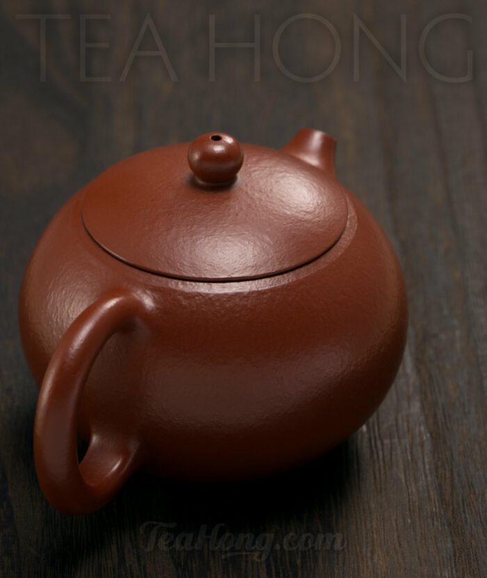 Fan Xi Ming: Xishi Yixing teapot: handle