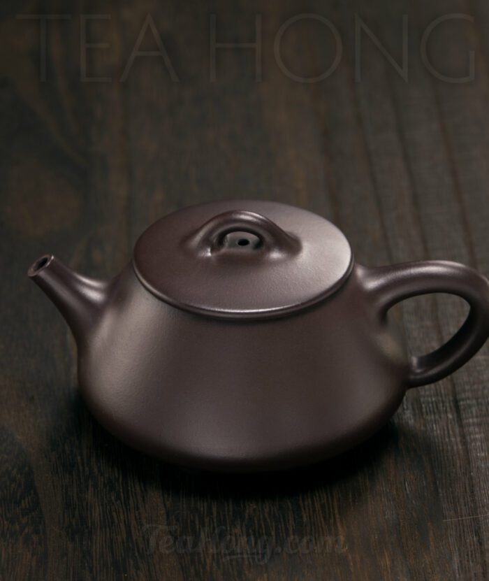 Hu Xiao Xiang: Stone Ladle Yixing teapot: side