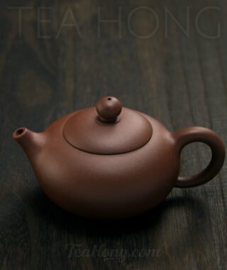 Yixing teapot "Bosom" by Zhou Guan Hua