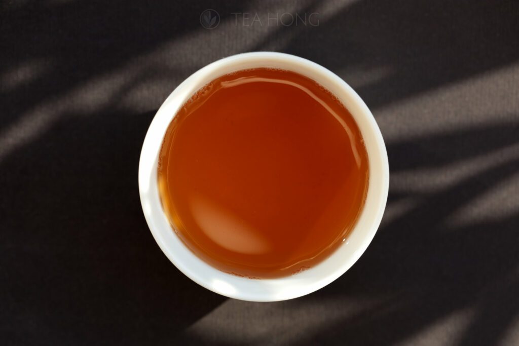 A bowl of tea infused from the Gold Stallion tealeaves