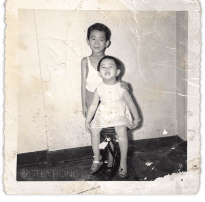With sister in a corner in the subdivided apartment in Wanchai, 1964