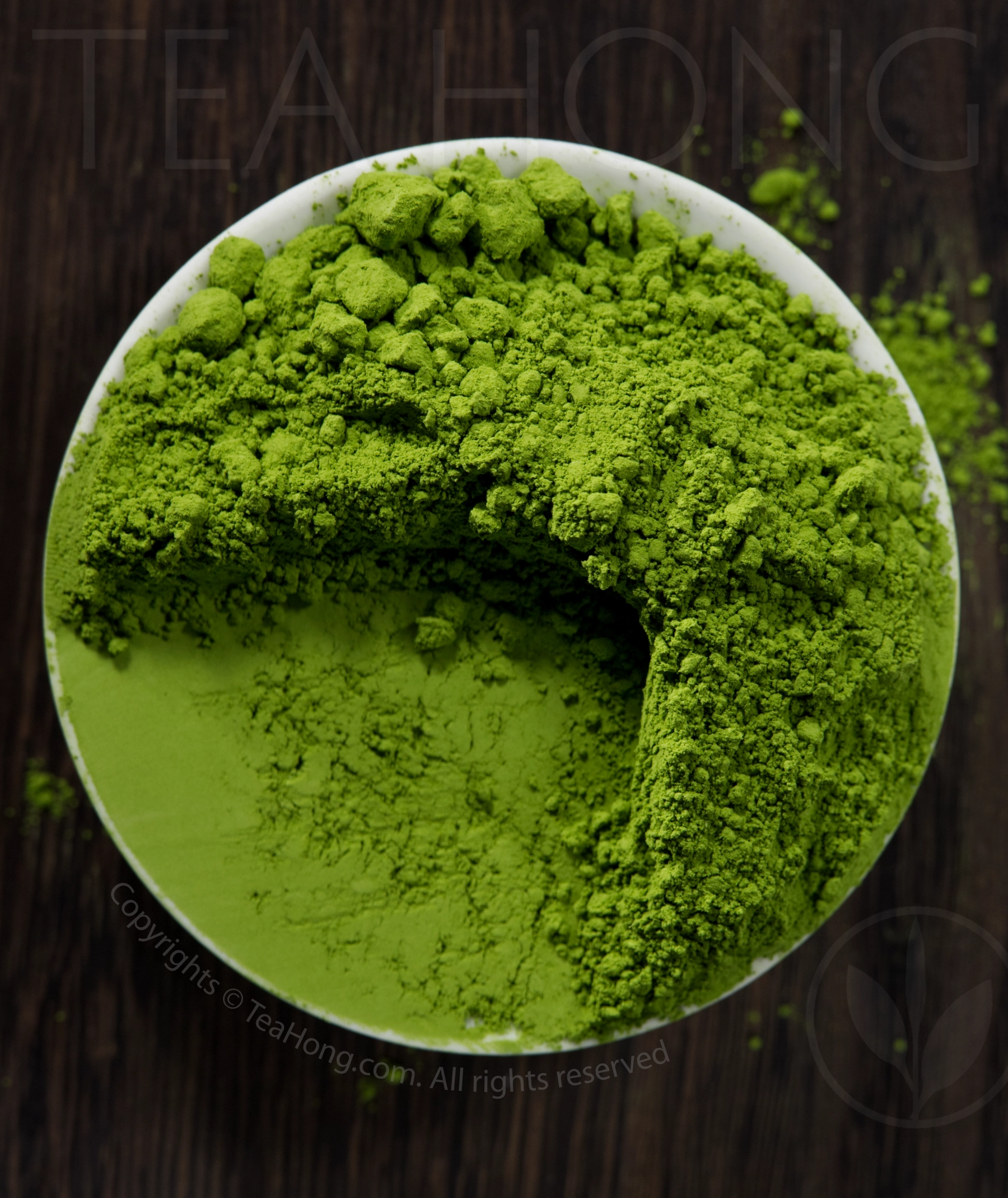 Ise Matcha Mugetsu The intense green colour of Tea Hong's Ise Matcha Mugetsu of a tea dish fully heaped with the powdered tea