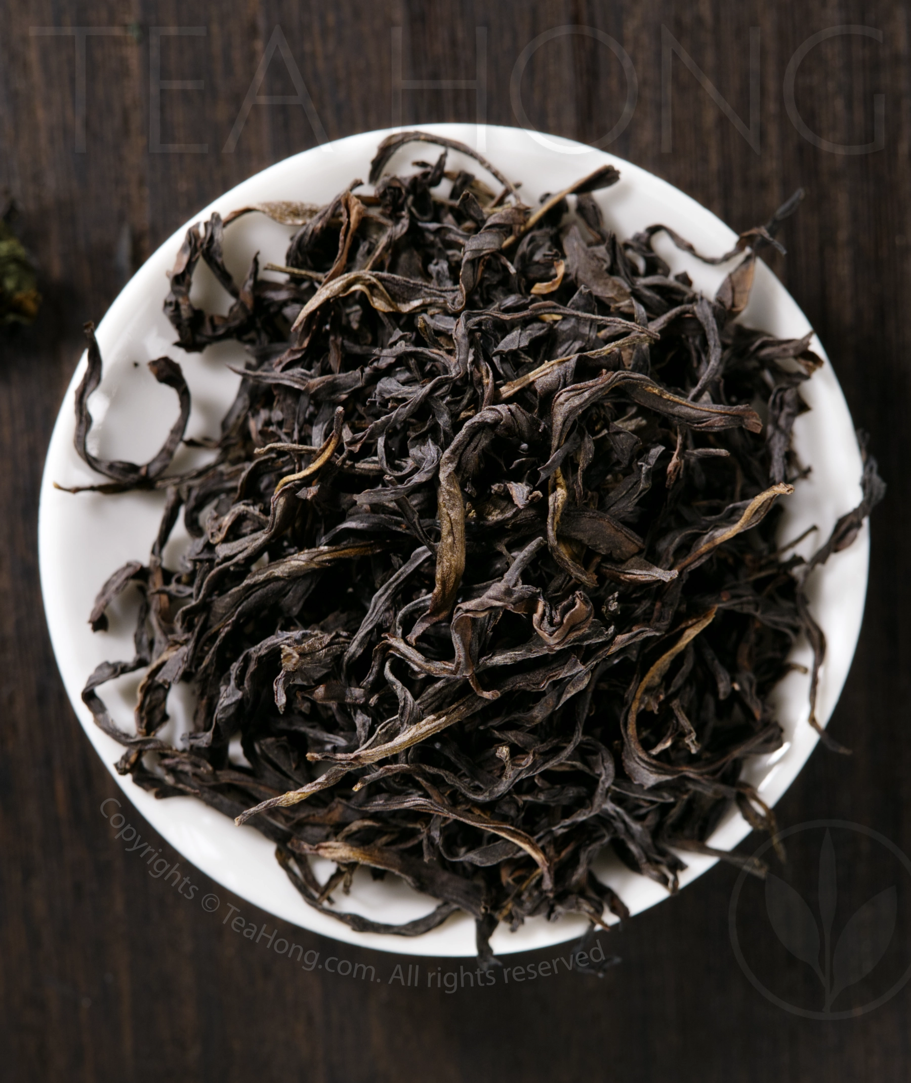 Old-ginger The deep colour tealeaves of the Phoenix oolong Fengxi Old Ginger