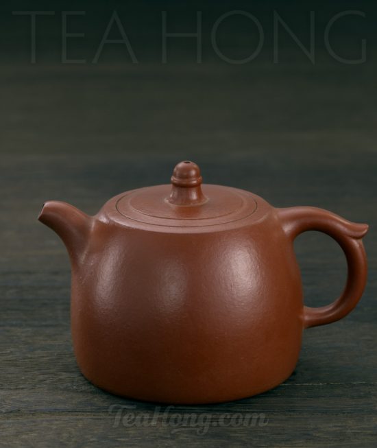 Qin Mu Yun: Little Well Rim, a Yixing zisha-hongni tea pot A Yixing teapot handcrafted by Qin Mu Yun: side view