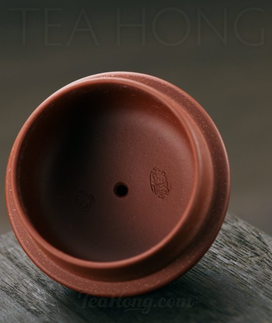 product template 804 x 955 A Yixing teapot handcrafted by Xu Feng: closeup showing the artist seals on the inner side of the lid