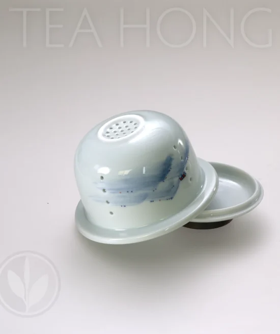 Infuser and lid of the Easy Life Traveller's Tea Set, Landscape painting option Infuser and lid of the Easy Life Traveller's Tea Set, Landscape painting option