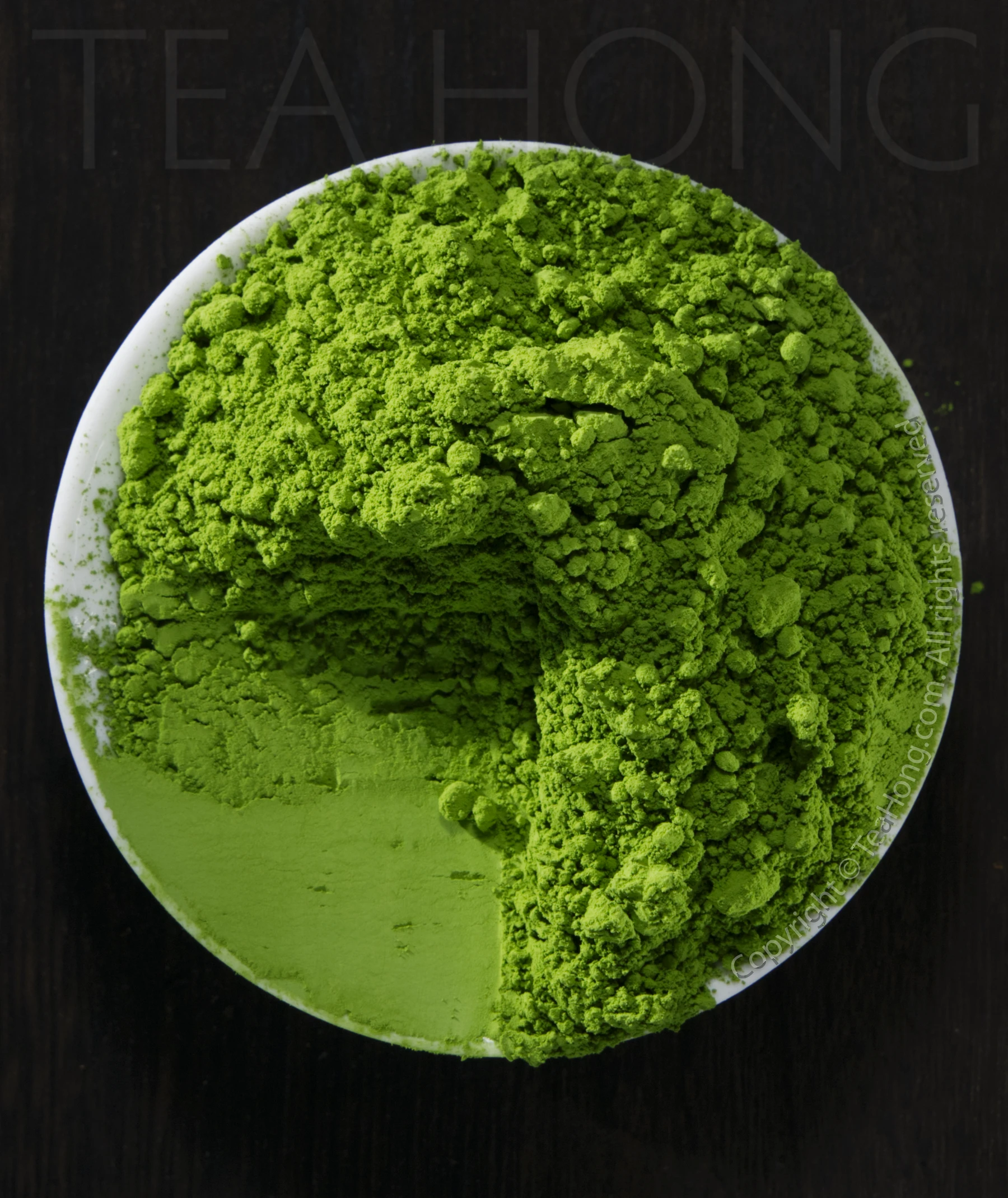 Nishio Matcha Supreme A round white dish filled with a pile of intensely green matcha
