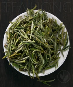Tea Hong's Huangshan Maofeng Supreme has a nickname amongst the local farmers: Green Specks in the Mists The tiny one tip and one leaf plucks of a genuine supreme quality Huangshan Maofeng green tea