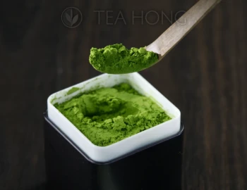 a scoop of intensely green tea powder