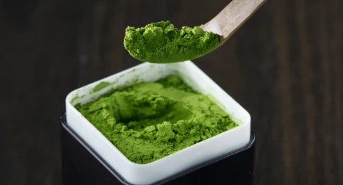 a scoop of intensely green tea powder